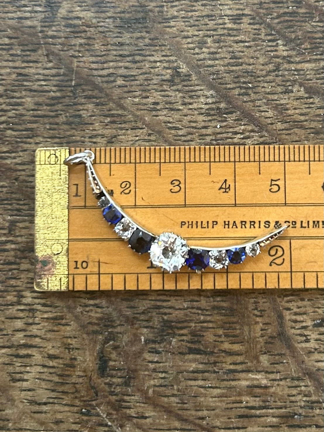 Antique paste and silver crescent brooch